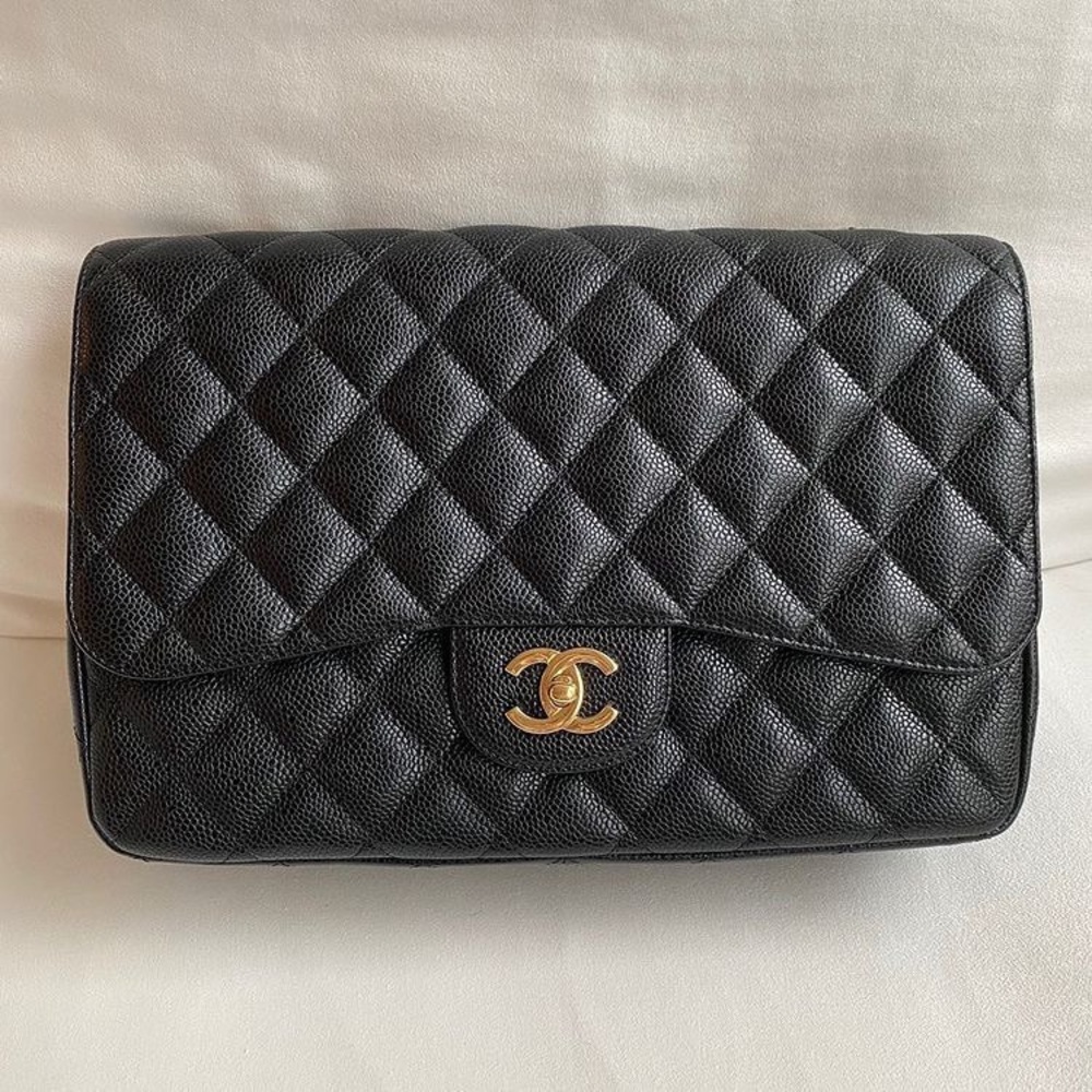 Chanel Classic Jumbo Single Flap Caviar leather with Gold chain.